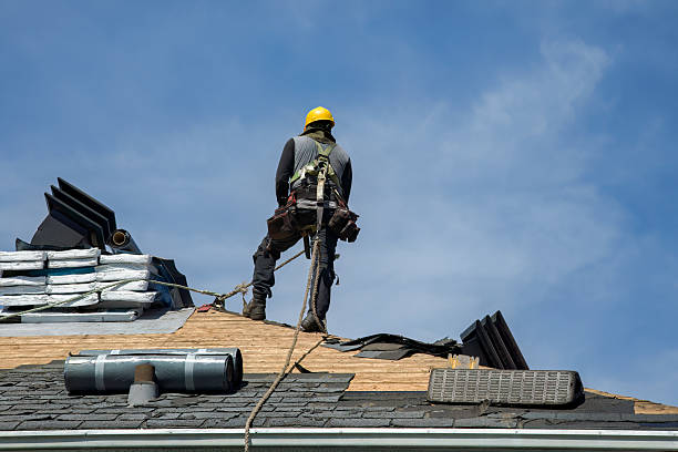 Professional Roofing technician working in Raymond, WI